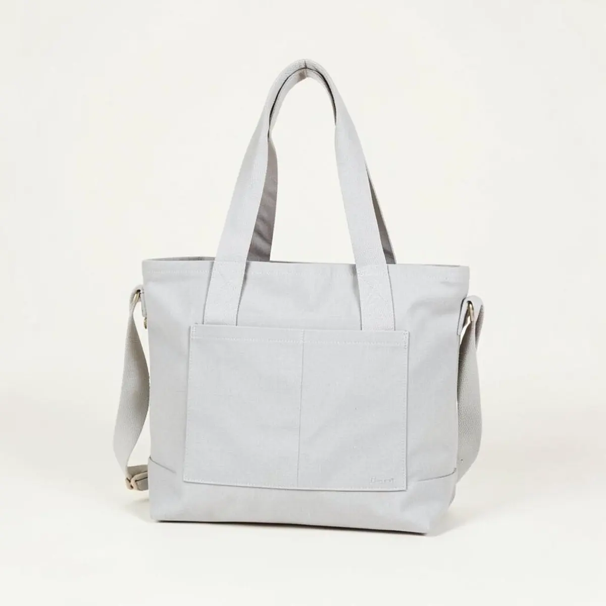 Assorted branded bags prepared for an event distribution